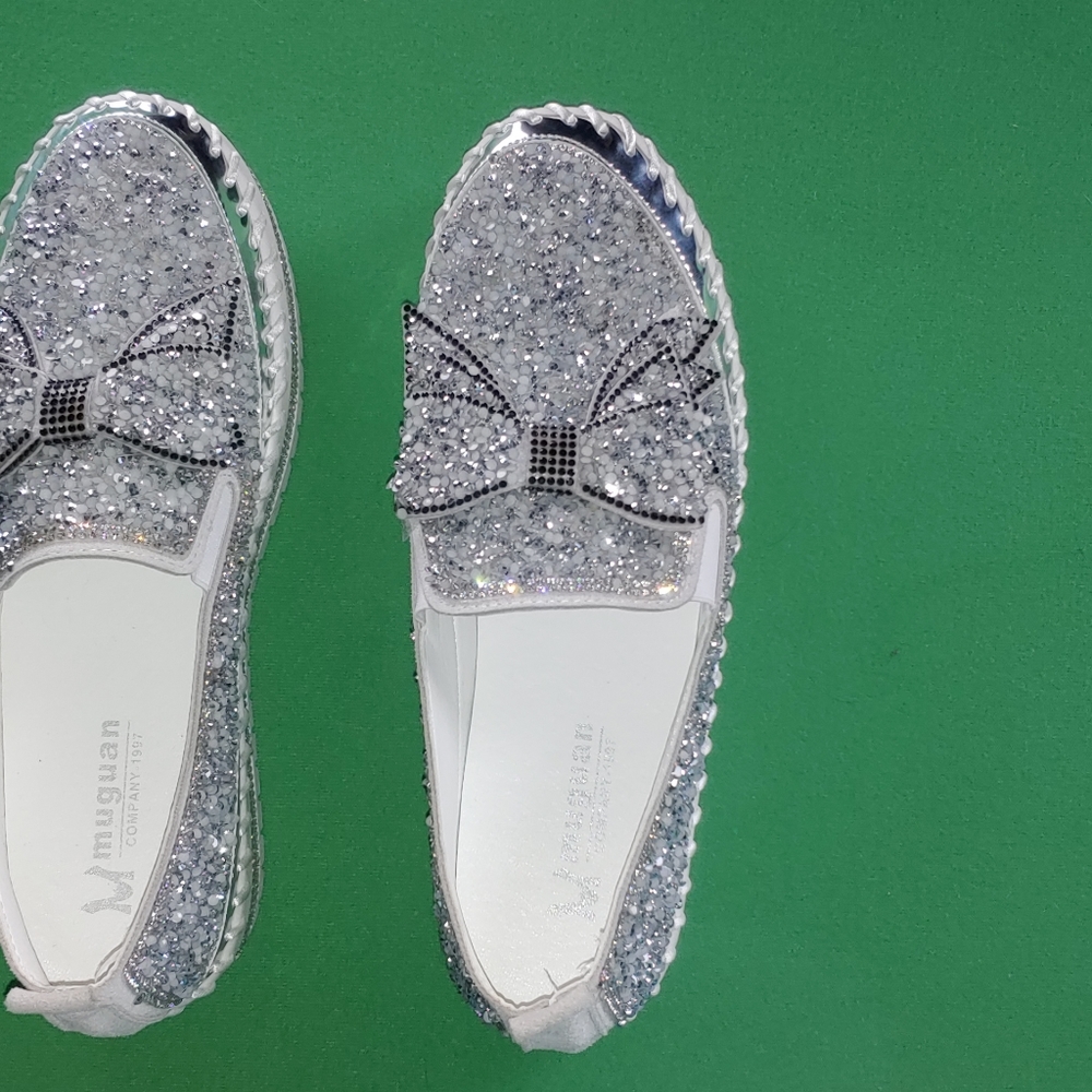 Never worn silver womens shoes size 9.5